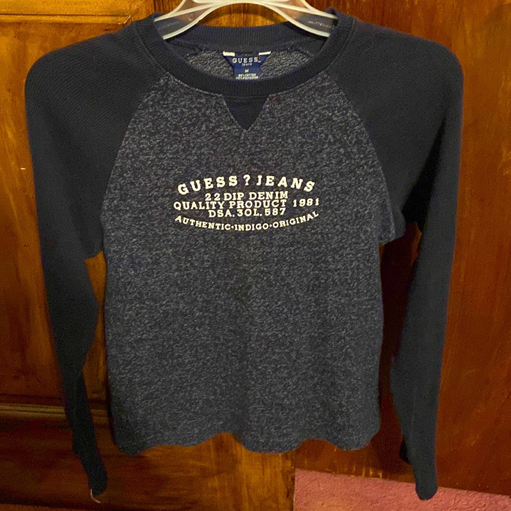 Guess top sleeve shirt, weight being between a tee and a sweatshirt.